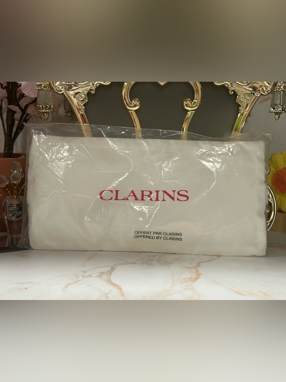 Clarins Spa Eye Cushion NWT. Use hot/cold. Attached band for security on head.